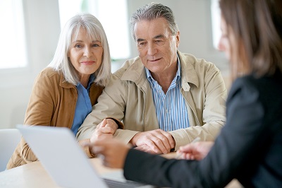 Senior couple meeting financial advisor